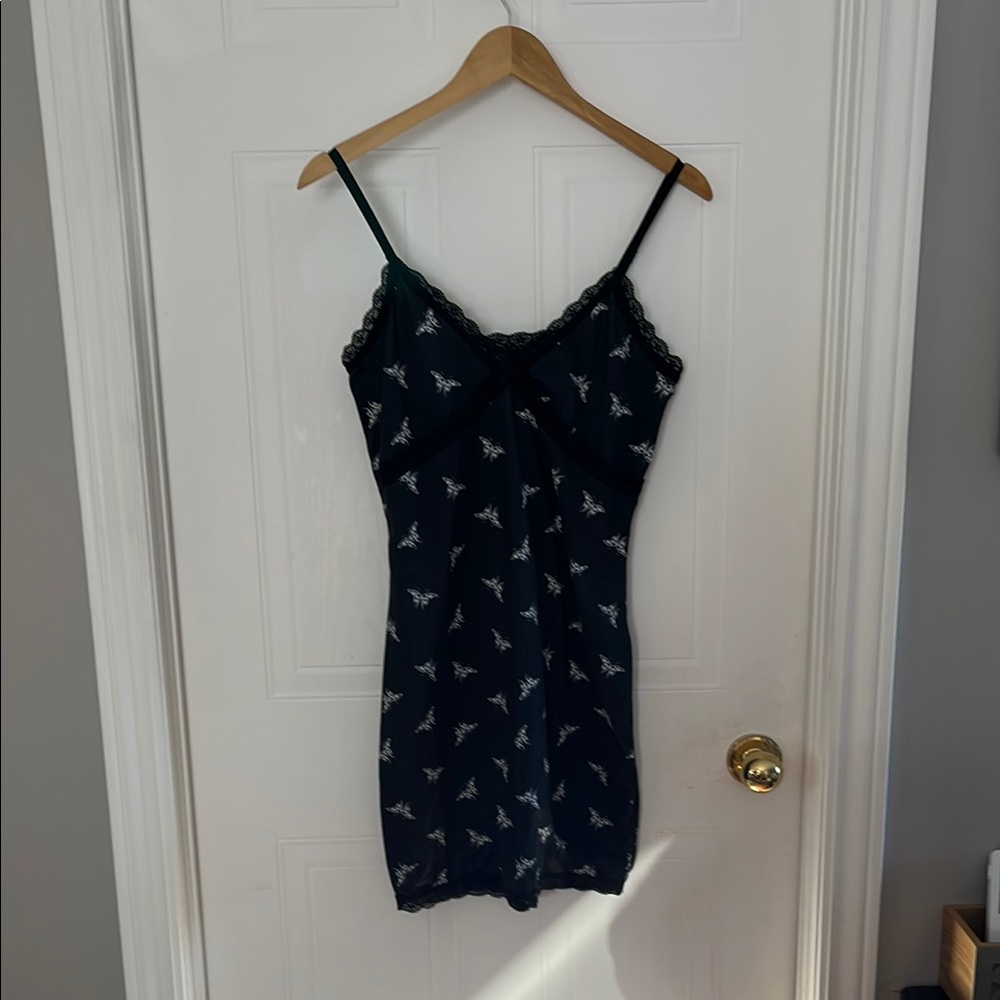 Divided Black nightgown with White butterfly Pattern